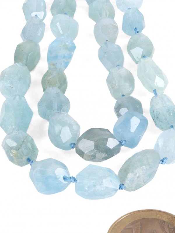 Aquamarine from Brazil, faceted nugget string